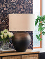 Newgerhard brown and black metal table lamp with drum shade, front view