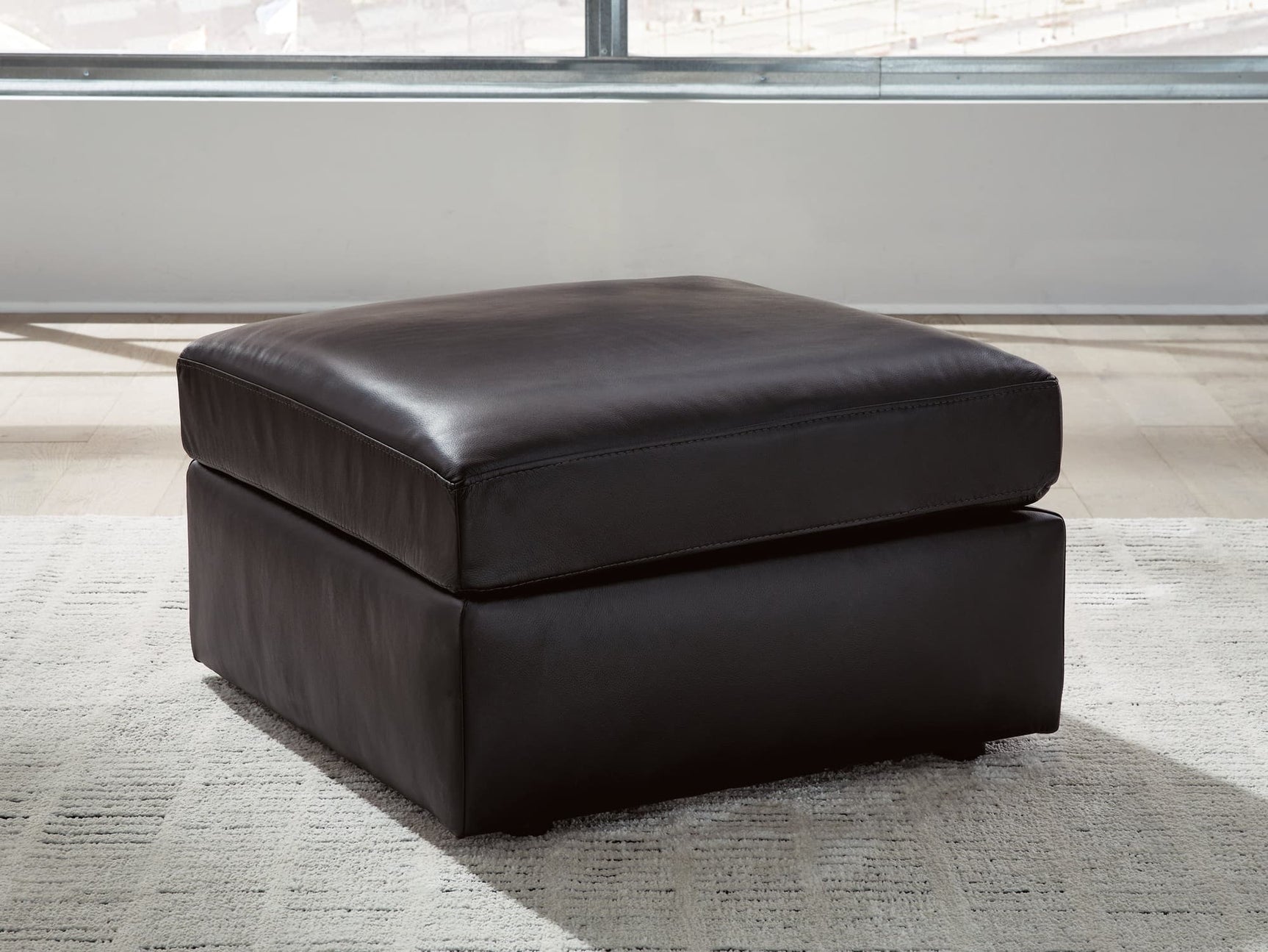 Modmax II black leather oversized accent ottoman front angle