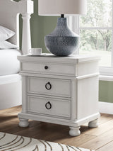 Rowlenstown Antique White Nightstand front view