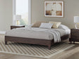 Calverson Brown King Platform Bed front view with walnut finish