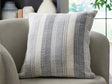 Adikus set of four blue, gray, and white striped accent pillows stacked
