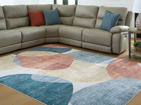 Chanleigh Multi Washable 7'6" x 9'6" Abstract Area Rug folded corner detail