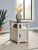 Fendenmore Two-Tone Chairside End Table front view showing storage cabinet closed