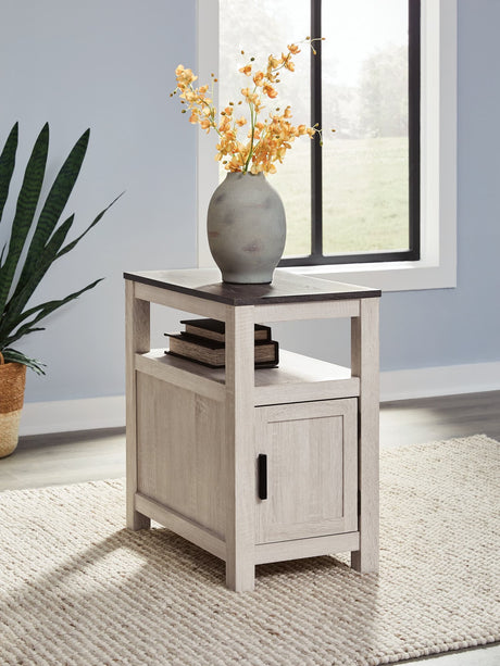 Fendenmore Two-Tone Chairside End Table front view showing storage cabinet closed