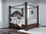 Maylee Dark Brown Queen Upholstered Canopy Bed angled side view