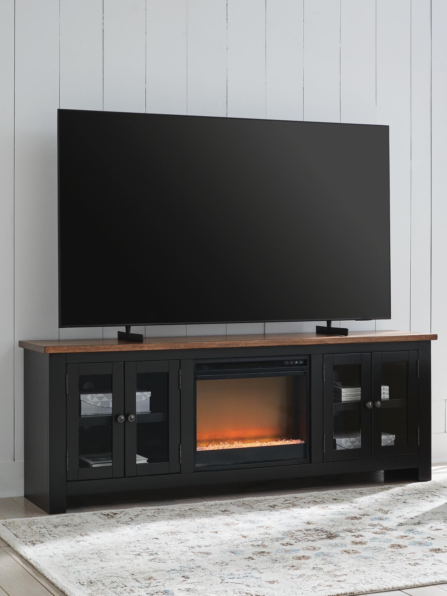 Wildenauer 76 inch TV stand with electric fireplace, front view