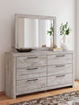 Broachmyn gray dresser with mirror front and slight side angle