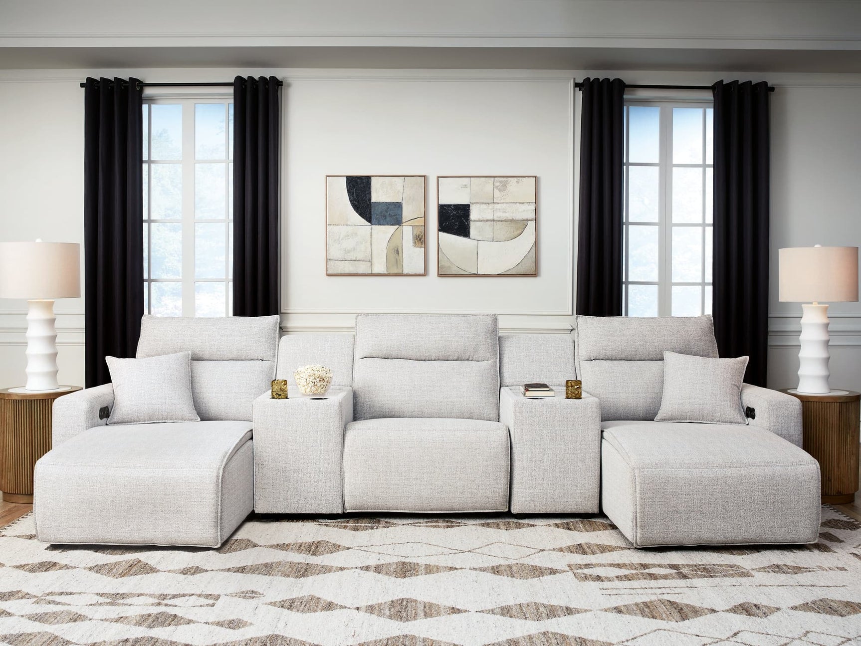 Modmax II Stone 5-Piece Power Reclining Sectional viewed from front angle with chaise and consoles