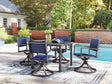 Rocky Gray Creek outdoor dining table and four blue padded sling chairs