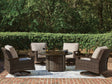 Monterey dark brown resin wicker outdoor fire pit table and four chairs set