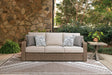 Laguna Beige Heights outdoor sofa with plush beige cushions