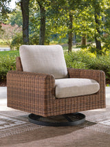 Dolan Creek outdoor swivel lounge chair in gray and brown resin wicker, front angle view