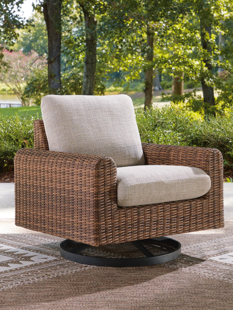 Dolan Creek outdoor swivel lounge chair in gray and brown resin wicker, front angle view