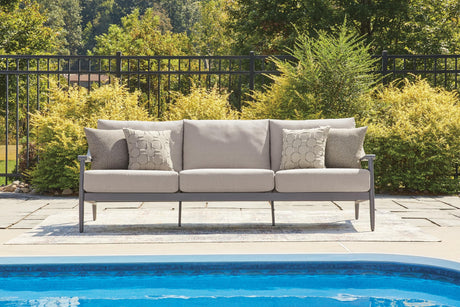 Ocean Beach gray outdoor sofa front angled view with cushions