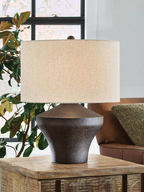 Dolanham Distressed Brown Table Lamp front view showing distressed finish and fabric shade