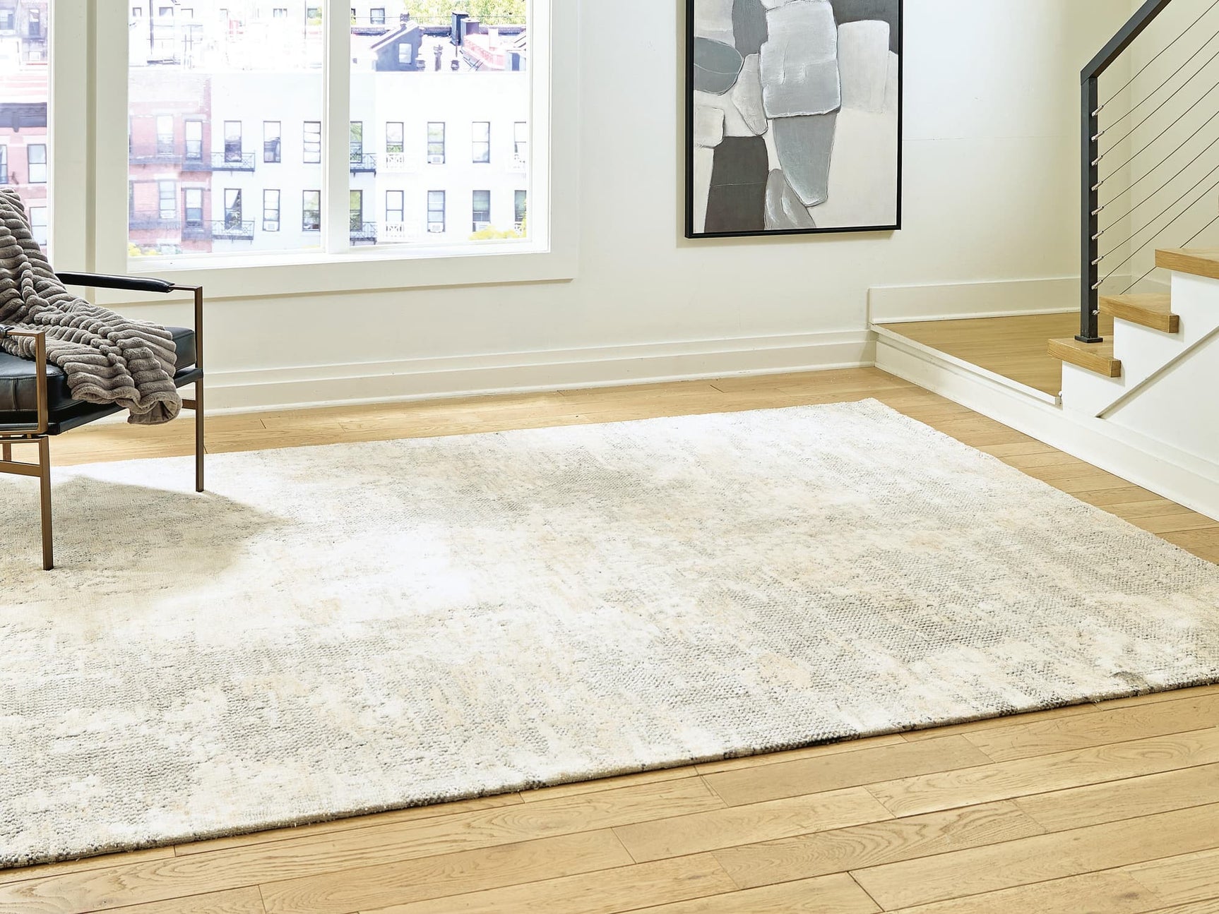 Raif large rug in gray, white, and cream colors, front view