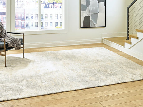 Raif large rug in gray, white, and cream colors, front view