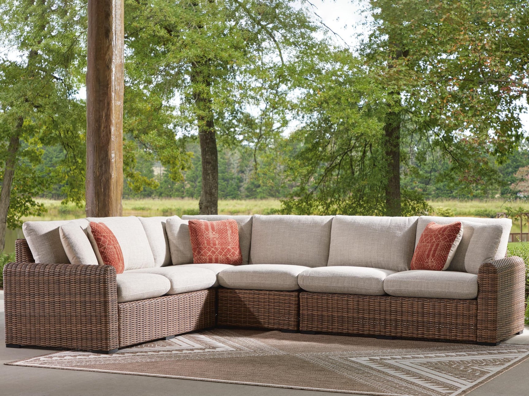 Dolan Creek Beige/Brown 4-Piece Outdoor Sectional front angle