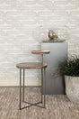 Yael Round Accent Table front view showing natural mango wood round tops and gunmetal X-shaped base