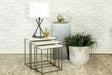 Caine nesting tables with white marble tops shown nested