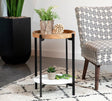 Adhvik round accent table showing natural mango wood top and black iron frame