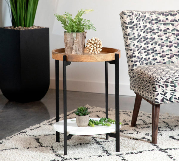 Adhvik round accent table showing natural mango wood top and black iron frame