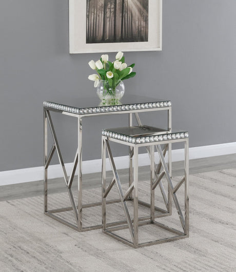 Betsy 2-Piece Silver Mirror Top Nesting Tables - angled view showing mirrored tops and geometric base