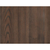 Gray tufted upholstered queen panel bed headboard close-up