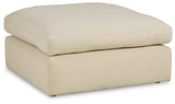 Room setting with Elyza Linen 3-Piece Sectional and Ottoman