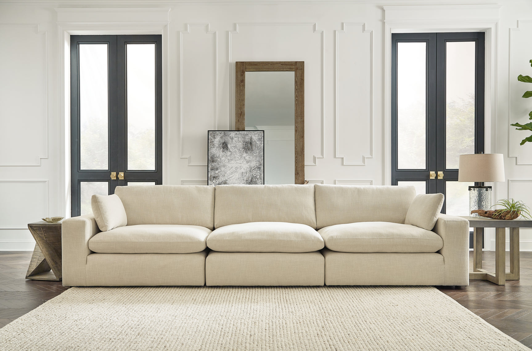 Living room view with Elyza Linen 3-Piece Sectional and Ottoman