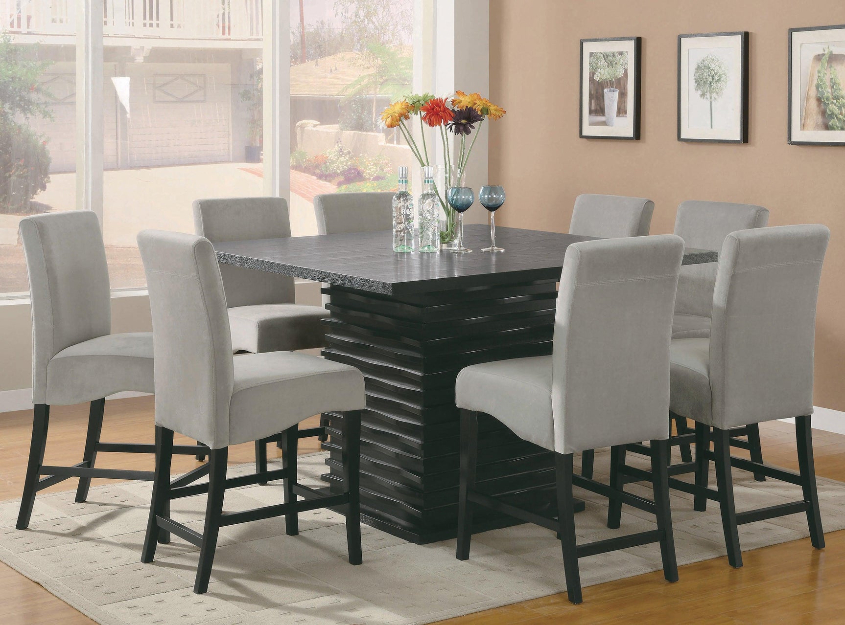 Dining table showing black layered pedestal base
