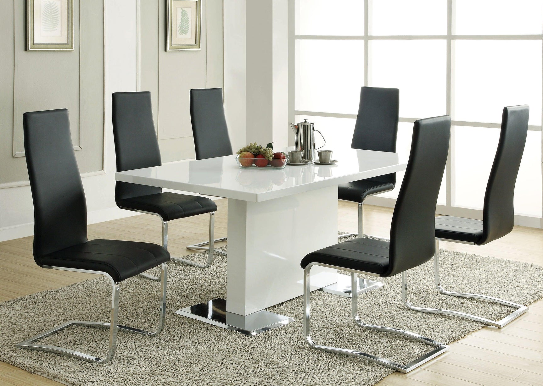 Montclair set of black dining chairs arranged around table
