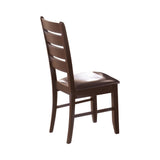 Close-up of Dalila dining table tapered leg and finish