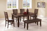 Close-up of tufted black cushioned seat on Dalila dining bench