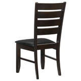 Close-up of chair's black leatherette padded seat and cappuccino frame