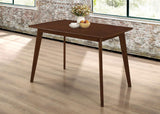 Kersey Dining Table angled legs front view in chestnut finish