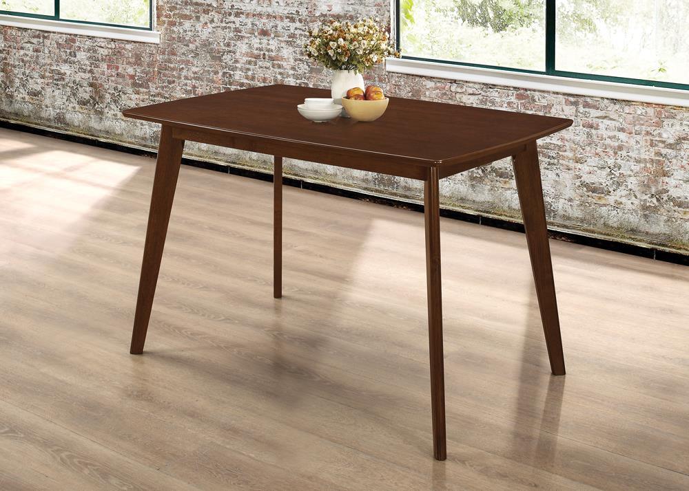 Kersey Dining Table angled legs front view in chestnut finish
