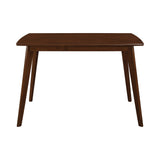 Room view of Kersey Brown Rectangular Dining Room Set with table and chairs