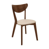 Side view of Kersey Dining Side Chair showcasing curved back and cushioned seat