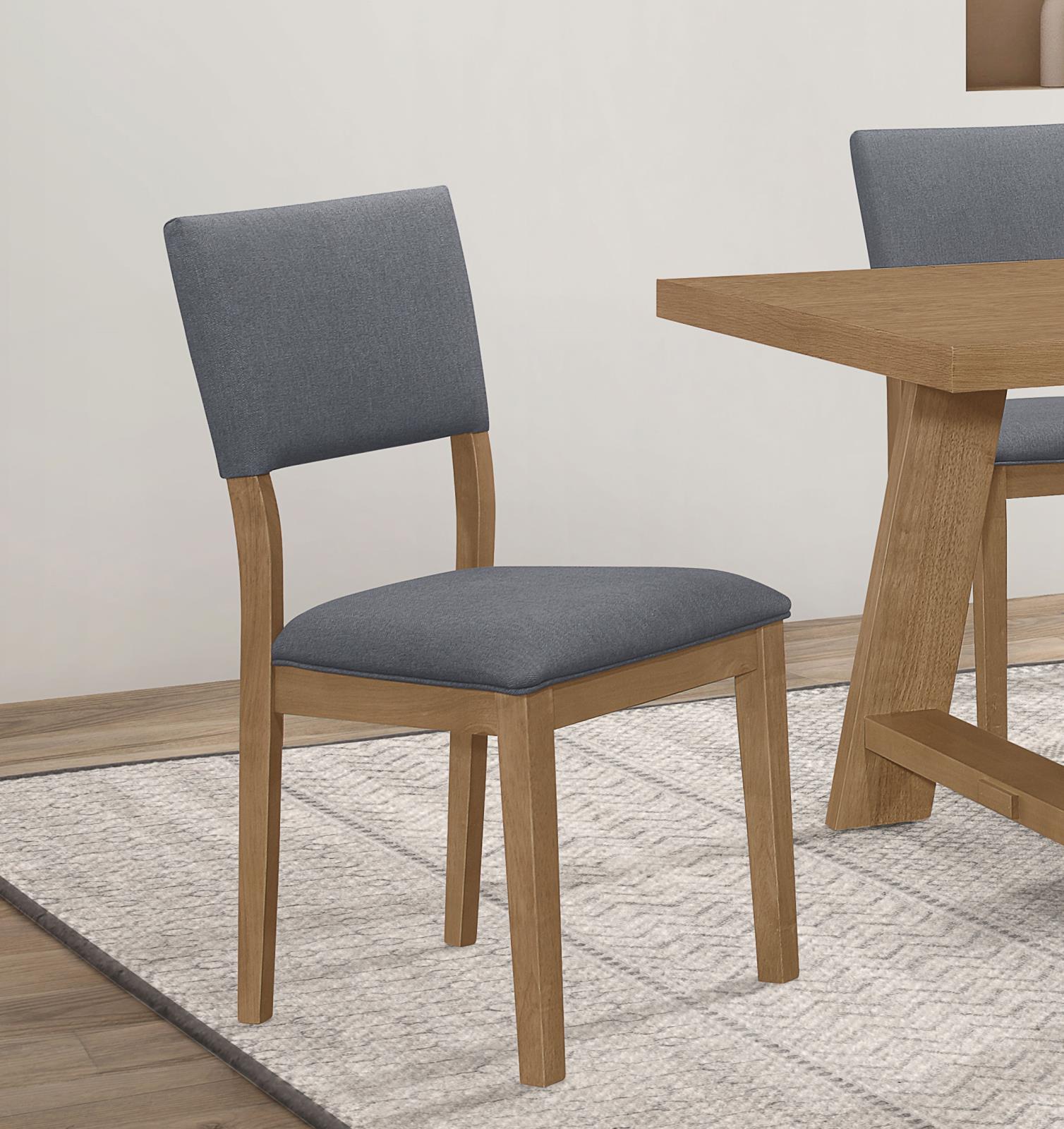 Grey upholstered dining arm chair side view