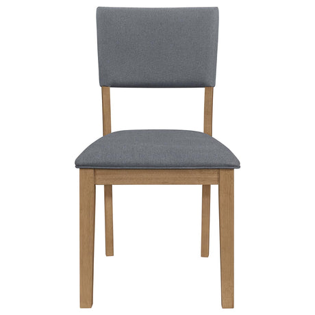 Grey upholstered dining arm chair detail view