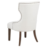 Baney chair seat cushion and wooden legs detail