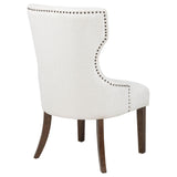 Baney cream fabric upholstered dining side chair with wingback and dark oak legs frontal view