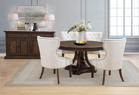 Baney cream fabric upholstered dining side chair with wingback and dark oak legs frontal view