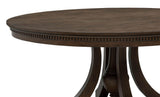 Ridgewell round pedestal dining table dark oak, detail of dentil trim and stepped foundation