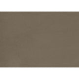 Urielle brown velvet accent chair styled in a living room setting