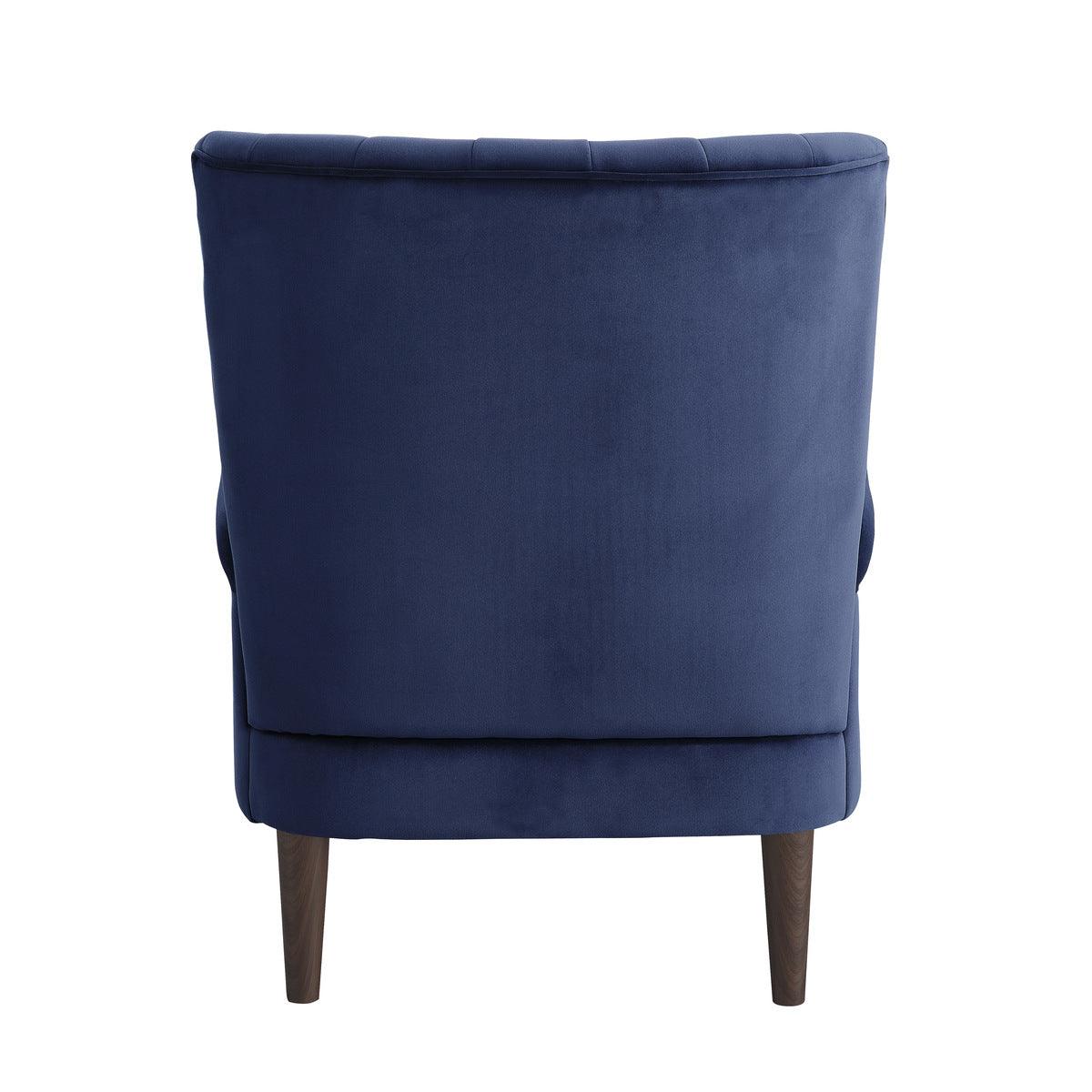 Close-up of navy velvet fabric and wood leg detail