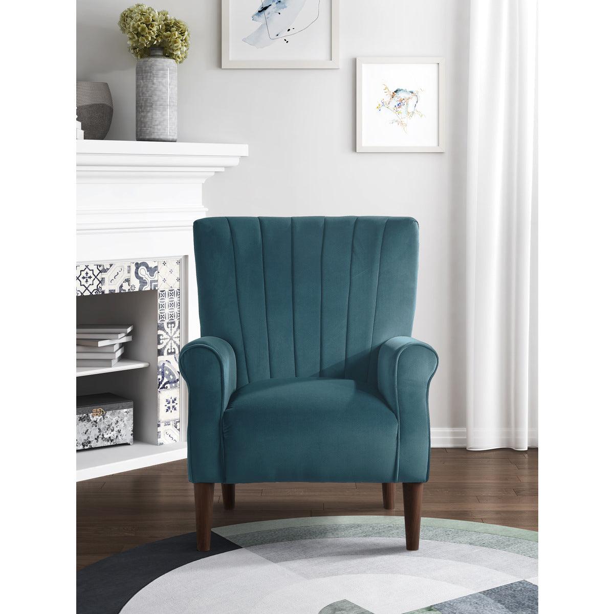 Urielle teal velvet accent chair positioned in a room setting