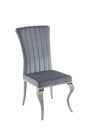 Front angle of Betty grey velvet dining side chair with curved chrome legs