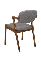 Side view showing angled back legs and demi arm on Malone chair